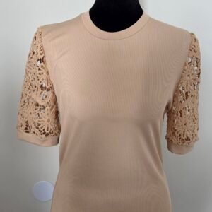 An elegant top with short lace sleeves, beige, medium size.