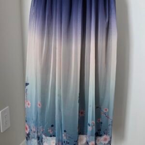 An elegant skirt, mesh fabric with flowers and blue butterflies, medium size.